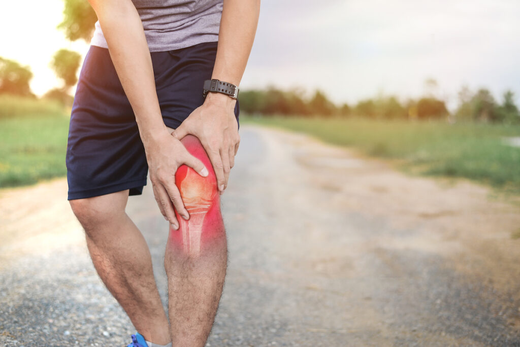suffering from strain and sprain injury while hiking
